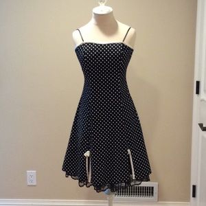 Black dress with white polka dots